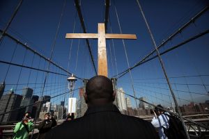Way Of The Cross Procession Crosses Over New York's Brooklyn Bridge