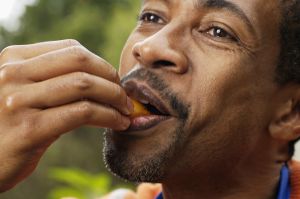 Close-up of man eating