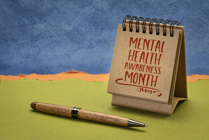 mental health awareness month, May - a note in a desktop calendar
